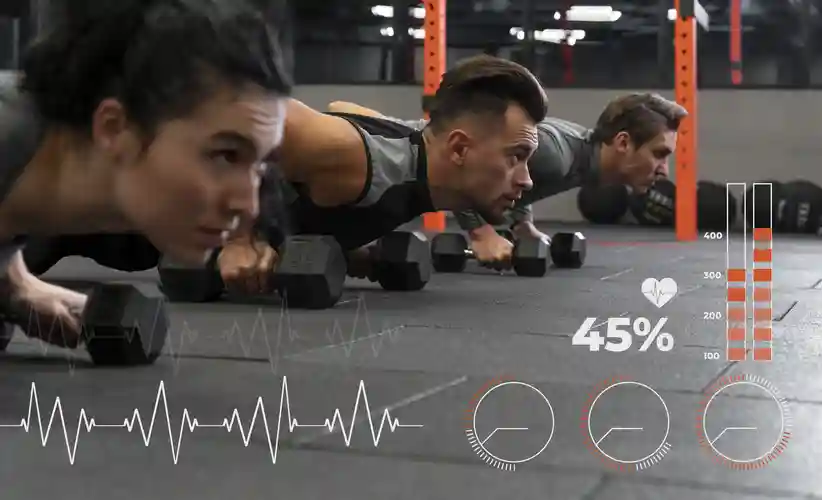 Three athletes training together with dumbbells as part of Deka Fit strength and conditioning plan