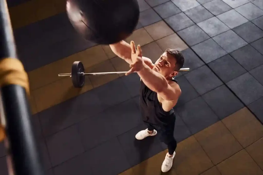 HYROX athlete performing wall balls during the final workout station at HYROX Hamburg Major 2025